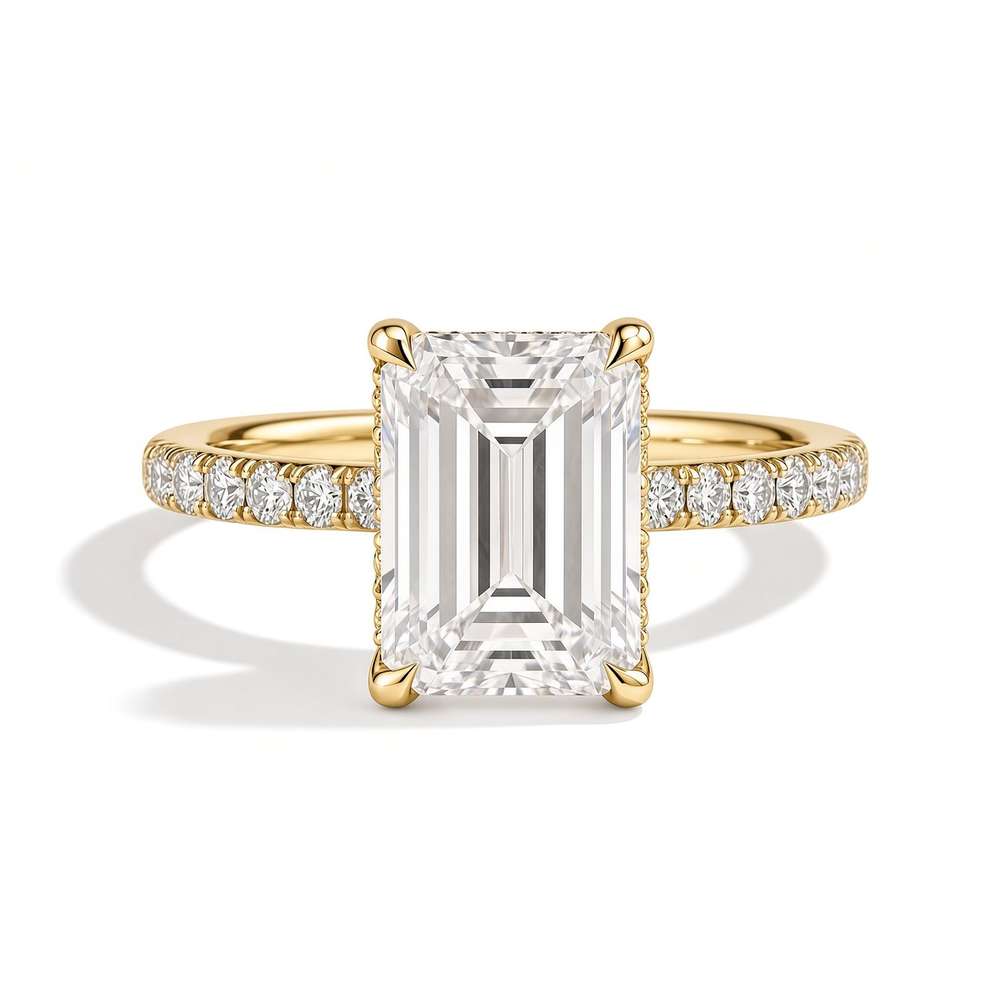 Emerald on Pavé Band in 18K Yellow Gold