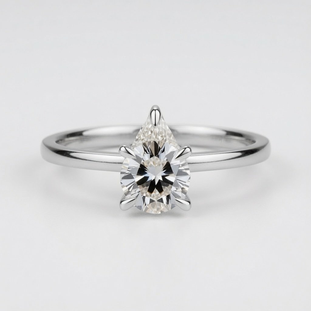 Pear Solitaire Ring in 18K White Gold